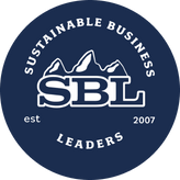 Logo of Sustainable Business Leaders with mountain design and text on a blue background