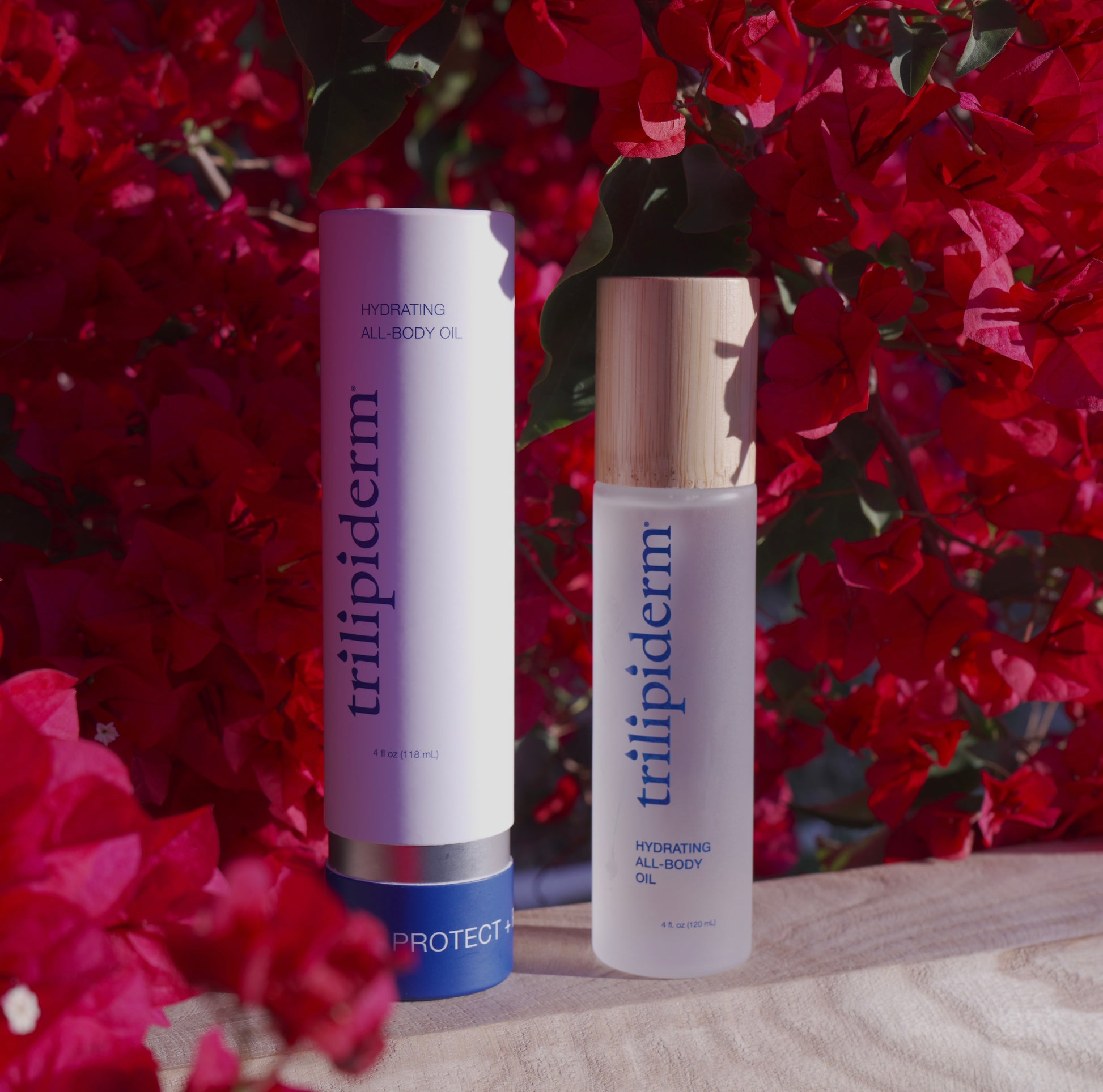 Two skincare products with 'trilipiderm' branding against a floral background