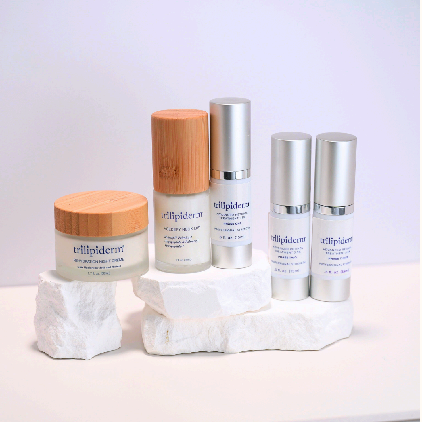 Trilipiderm skincare products on a white background
