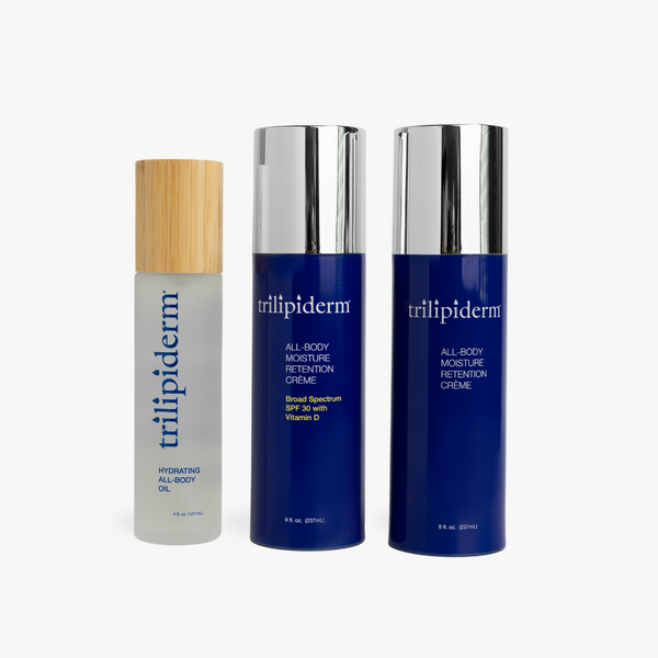 Three skincare products from the brand 'trilipiderm' on a white background