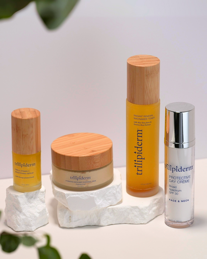 Skincare products from the brand 'erilipiderm' on a white surface with a light background.