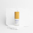 age defy neck lift with glass bottle and bamboo top displayed on white rock