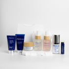 Trillipiderm skincare products on a white background and white rock