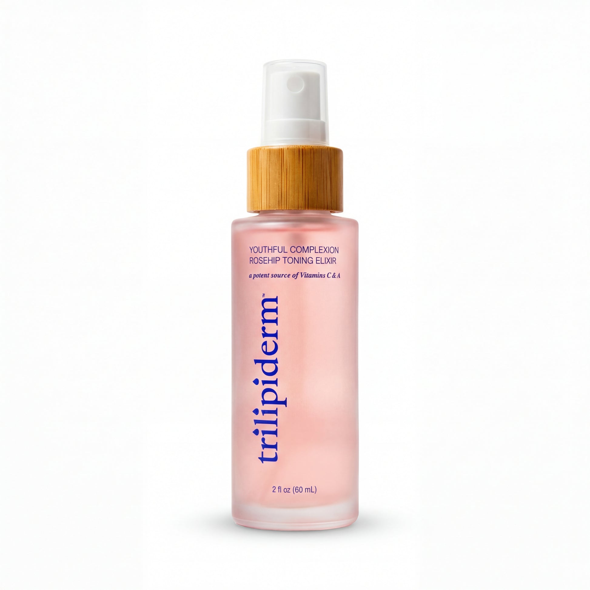Trilipiderm Youthful Complexion Rosehip Toning Elixir 2 oz travel size toner mist in frosted blush glass bottle with bamboo cap and white spray nozzle on white background. Lightweight antioxidant-rich rosehip facial mist formulated with Vitamins C & A to support skin barrier hydration, glass-skin glow, and refreshed complexion. Luxury clean skincare mini size.