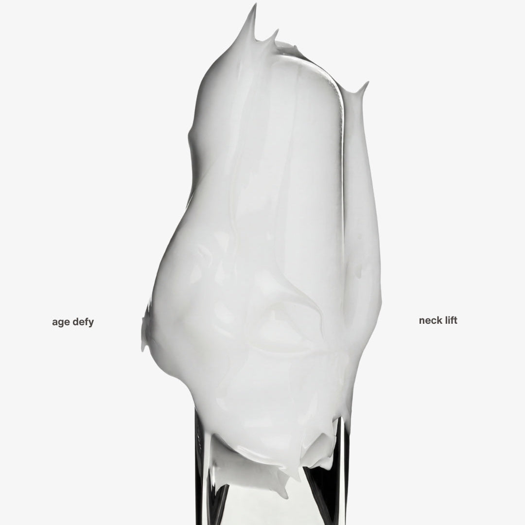 age defy neck lift skin care white velvety cream texture swatch on a metal spooley. Rich cream texture with anti aging benefits  