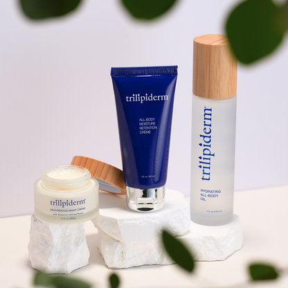 Trilipiderm Barrier Rescue Trio featuring Hydrating All-Body Oil, All-Body Moisture Retention Crème, and Rehydration Night Crème for barrier support, deep hydration, and moisture retention.