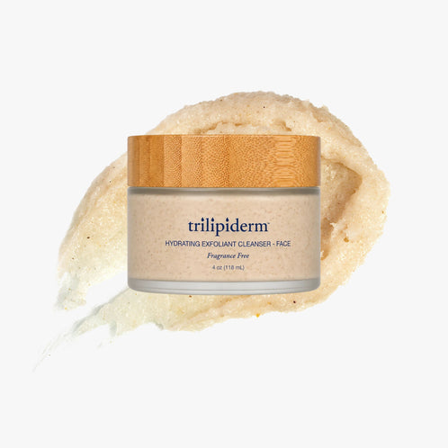Trilipiderm Hydrating Exfoliant Cleanser for face, fragrance free, in a 4 oz frosted glass jar with a bamboo lid, shown with a swatch of its gentle exfoliating scrub texture.