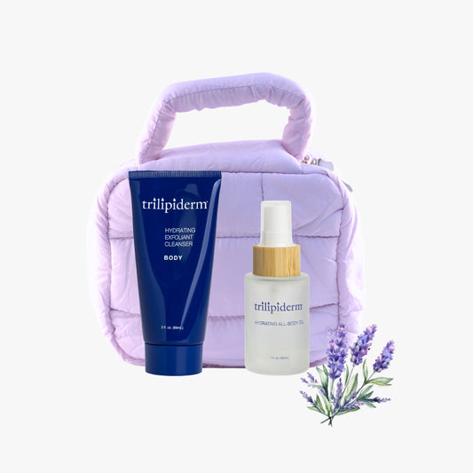 Trilipiderm Lavender Essence Duo featuring Hydrating All-Body Oil and Exfoliating Body Cleanser with calming lavender and luxury puffer pouch, perfect holiday gift set.
