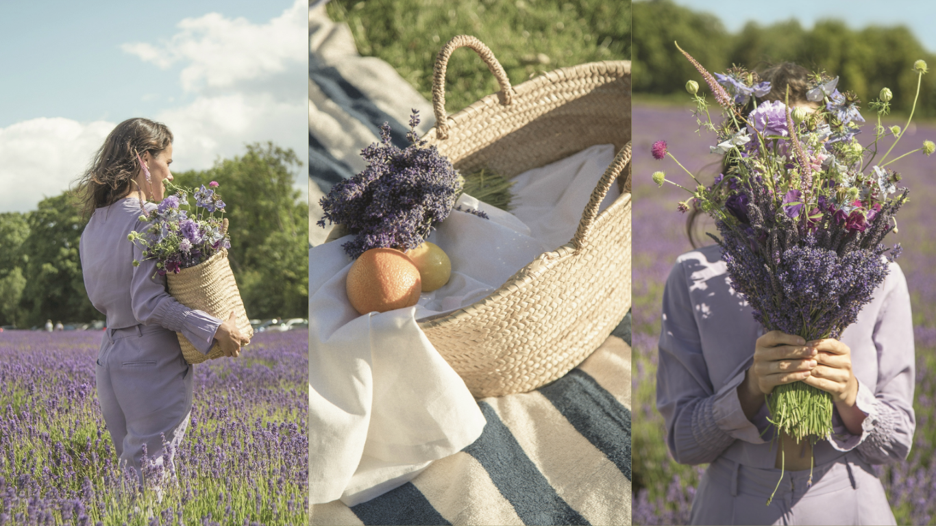 Woman in lavender field holding wildflower bouquet and woven basket during summer picnic in natural light