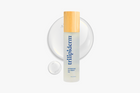 Trilipiderm hydrating all-body oil bottle with wooden cap on a white background and swatch